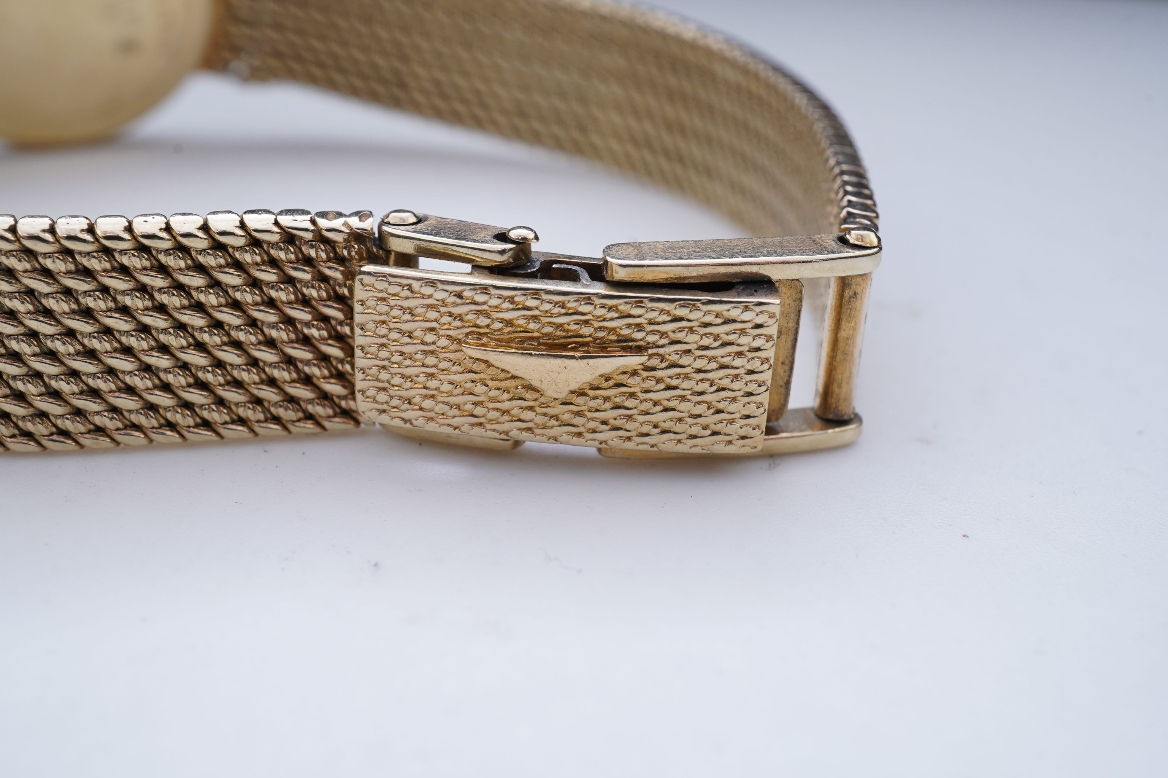 Longines, a gold watch